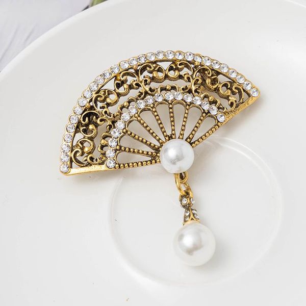 pins, brooches rhao traditional ethnic style ancient golden hollow fan hanging pearl shape brooch, classic all-match creative coat pins., Gray
pins, brooches rhao traditional ethnic style ancient golden hollow fan hanging pearl shape brooch, classic all-match creative coat pins., Gray