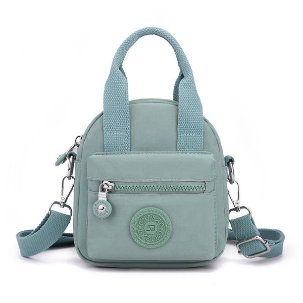 wholesale women bag casual nylon cloth handbag shoulderbag small round messenger shopping and tourism backpack
wholesale women bag casual nylon cloth handbag shoulderbag small round messenger shopping and tourism backpack