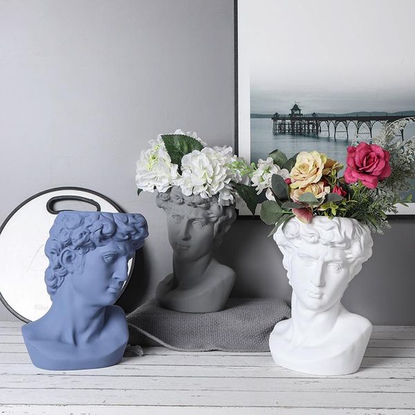creative head vase ceramic portrait sculpture flower pot deskarrangement container table deco home vases
creative head vase ceramic portrait sculpture flower pot deskarrangement container table deco home vases