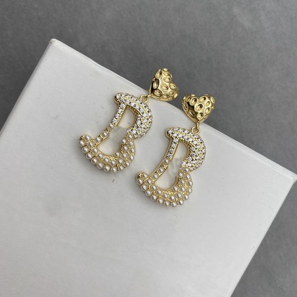 21 new micro inlaid pearl super immortal cold wind high sense fashion classic earrings, Silver
21 new micro inlaid pearl super immortal cold wind high sense fashion classic earrings, Silver