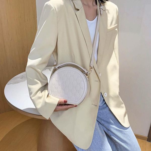 fashion embossed small round bag portable ladies shoulder solid color messenger cross body
fashion embossed small round bag portable ladies shoulder solid color messenger cross body