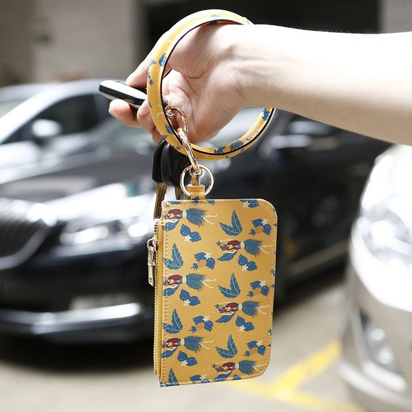 chrysanthemum pu wrist key chain card bag leaf leather sports bracelet zero wallet pendant bracelet key chain k68178, Silver
chrysanthemum pu wrist key chain card bag leaf leather sports bracelet zero wallet pendant bracelet key chain k68178, Silver