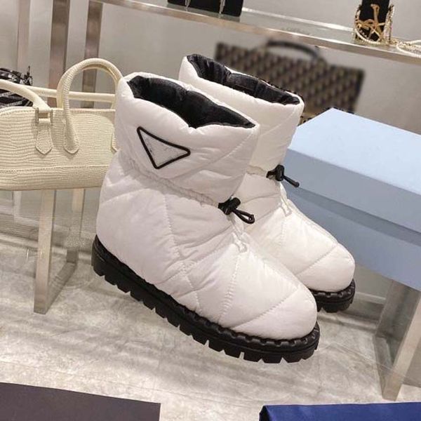 fashion designer boots booties the comfort boot warm winter comes in water-repellent nylon with down filling and can be worn outdoors as wel, Black
fashion designer boots booties the comfort boot warm winter comes in water-repellent nylon with down filling and can be worn outdoors as wel, Black