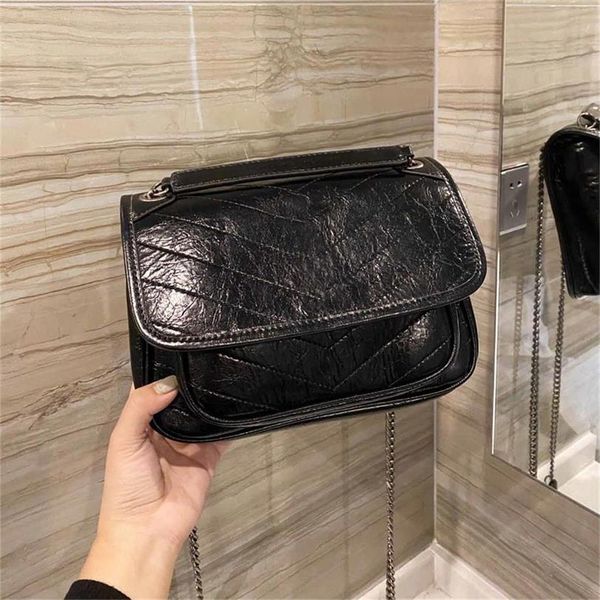 2021 niki designer brand ladies fashion leather messenger bag classic quality wallet two colors to send the box
2021 niki designer brand ladies fashion leather messenger bag classic quality wallet two colors to send the box