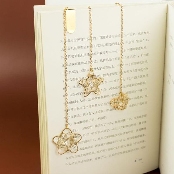 bookmark star hollow out animals gold color metal flower heart shape creative stationery gift
bookmark star hollow out animals gold color metal flower heart shape creative stationery gift