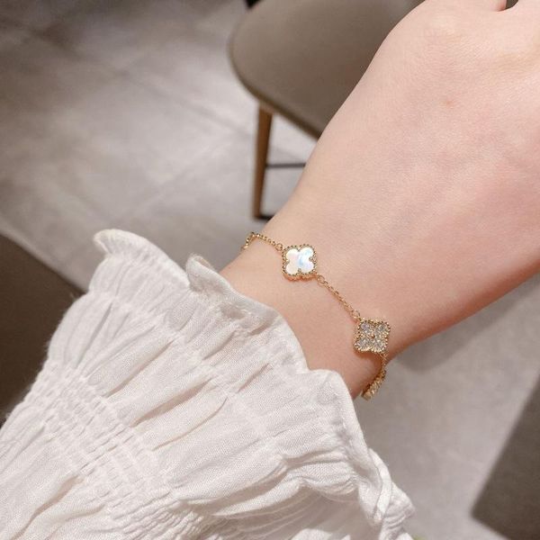 beaded, strands korean version of the double-sided shell four-leaf grass bracelet zircon inlaid with real gold-plated clover, Black
beaded, strands korean version of the double-sided shell four-leaf grass bracelet zircon inlaid with real gold-plated clover, Black