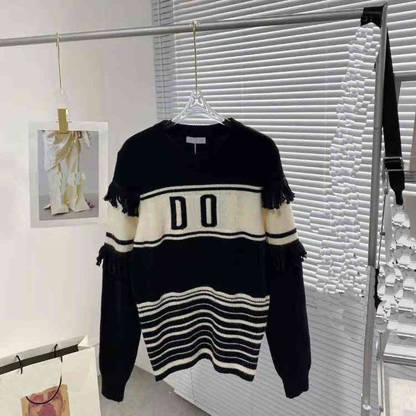 design 21 autumn new british black and white contrast tassel women's casual lazy long sleeve sweater
design 21 autumn new british black and white contrast tassel women's casual lazy long sleeve sweater