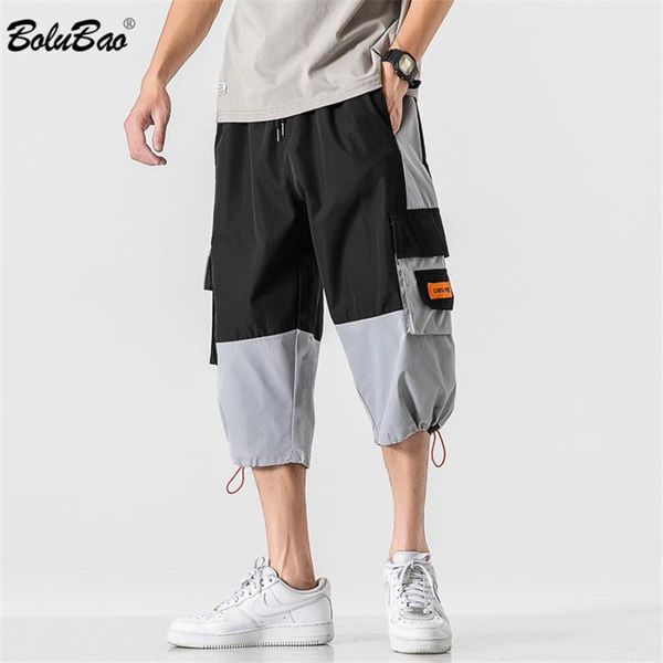 men elastic waist loose casual pants sweatpants breathable pocket straight cropped trousers men's shorts, White;black
men elastic waist loose casual pants sweatpants breathable pocket straight cropped trousers men's shorts, White;black