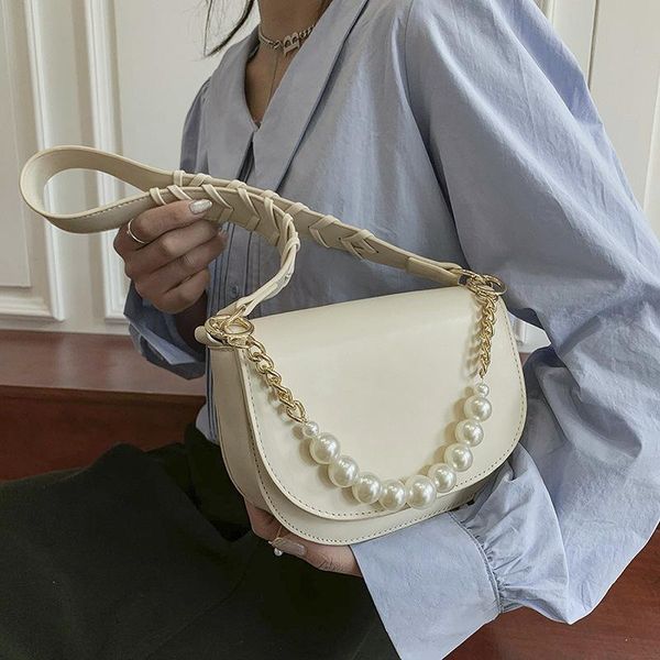 cross body retro texture single shoulder messenger bag small female spring/summer 2021 korean fashion ladies simple pearl handbag
cross body retro texture single shoulder messenger bag small female spring/summer 2021 korean fashion ladies simple pearl handbag