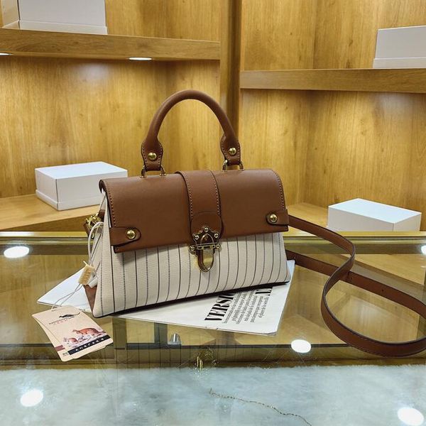 wholesale factory ladies shoulder bags simple and elegant printed handbag street personalized rivet backpack european and american popular s
wholesale factory ladies shoulder bags simple and elegant printed handbag street personalized rivet backpack european and american popular s