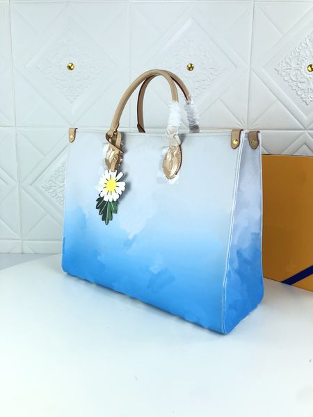 m57640 m57641 m57639 onthego gm tote bags accessorized with a colorful leather flower charm by the pool bag womens handle shoulder straps
m57640 m57641 m57639 onthego gm tote bags accessorized with a colorful leather flower charm by the pool bag womens handle shoulder straps