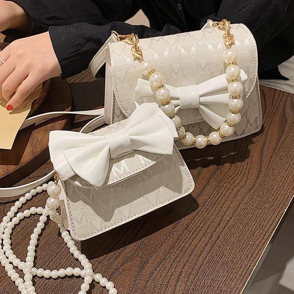 evening bags bow square tote bag mini crossbody 2021 summer nylon women's designer handbag pearl strap shoulder messenger purses
evening bags bow square tote bag mini crossbody 2021 summer nylon women's designer handbag pearl strap shoulder messenger purses