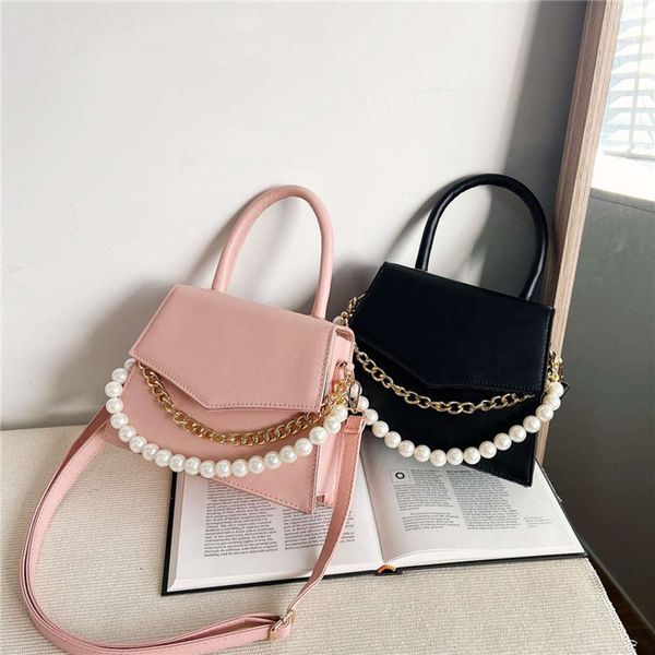 2021 trend korean pearl chain small square bag pu simple envelope fashion women's one shoulder hand
2021 trend korean pearl chain small square bag pu simple envelope fashion women's one shoulder hand
