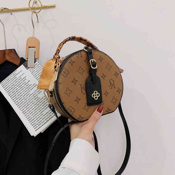 2022 factory outlet bag female new old flower round cake single shoulder messenger women's bag portable foreign style korean online red 
2022 factory outlet bag female new old flower round cake single shoulder messenger women's bag portable foreign style korean online red