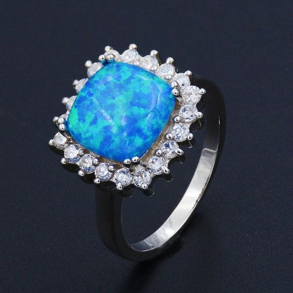 cluster rings square blue fire opal for engagement, Golden;silver 
cluster rings square blue fire opal for engagement, Golden;silver