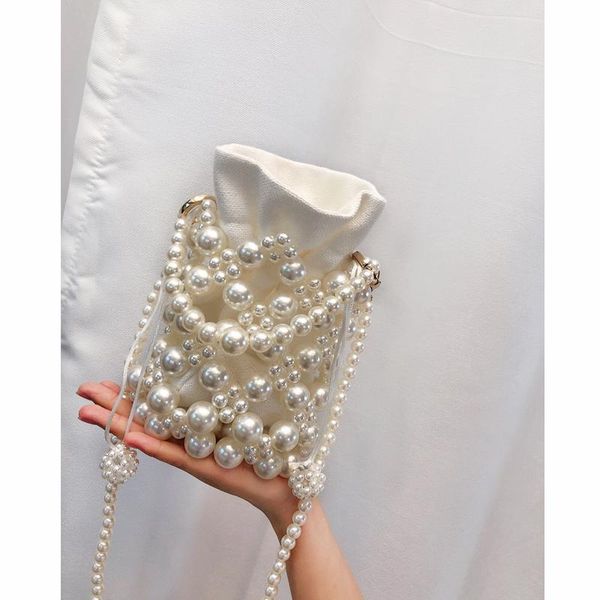 evening bags fashion handmade pearls handbags beading for women vintage party ladies luxury hollow tote shoulder
evening bags fashion handmade pearls handbags beading for women vintage party ladies luxury hollow tote shoulder