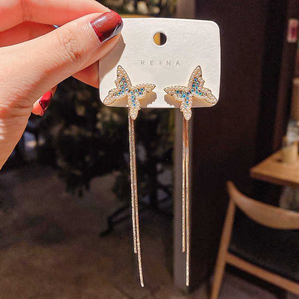 925 silver needle inlaid diamond butterfly earrings designer dongdamen temperament super fairy tassel net red trend earrings girl
925 silver needle inlaid diamond butterfly earrings designer dongdamen temperament super fairy tassel net red trend earrings girl