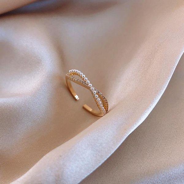 exquisite copper inlaid zircon simple ring elegant white pearl opening adjustable women's wedding party korean jewelry cluster rings, Golden;silver
exquisite copper inlaid zircon simple ring elegant white pearl opening adjustable women's wedding party korean jewelry cluster rings, Golden;silver