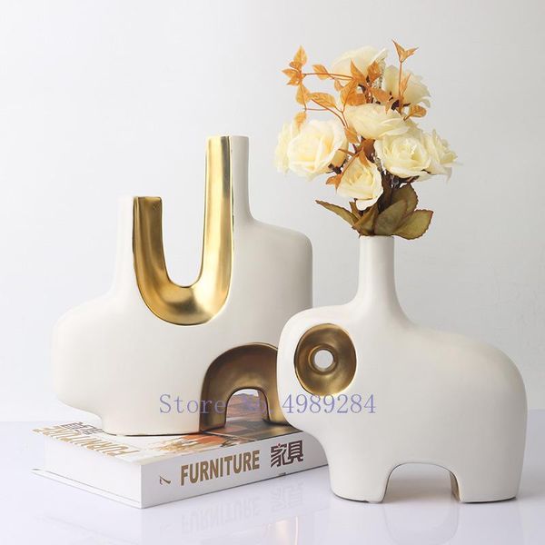 ceramic vase abstract golden cutout handicraft furnishings irregular flower arrangement modern home decoration accessories vases
ceramic vase abstract golden cutout handicraft furnishings irregular flower arrangement modern home decoration accessories vases