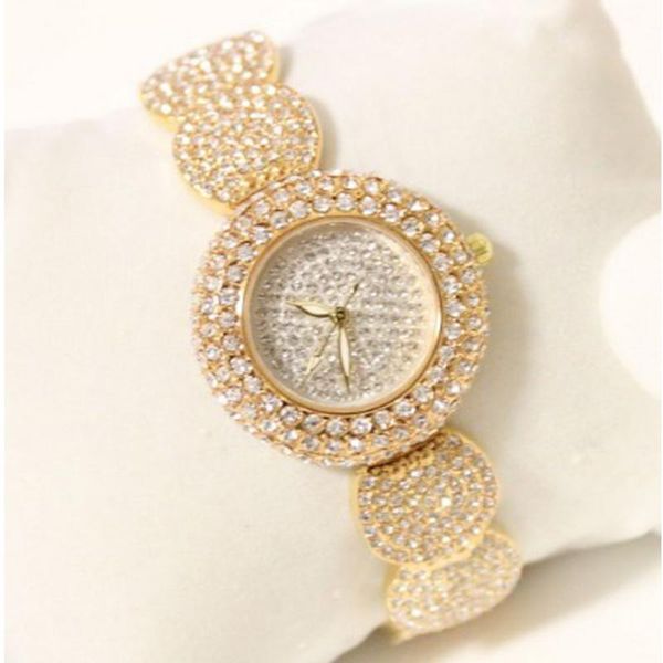 wristwatches women watch fashion relogio feminino ladies gold steel quartz watches casual crystal rhinestone clock, Slivery;brown 
wristwatches women watch fashion relogio feminino ladies gold steel quartz watches casual crystal rhinestone clock, Slivery;brown