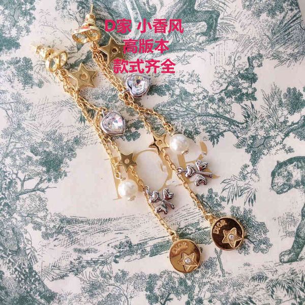 tina clover d home five pointed star love pearl tassel earrings 925 sier needle female high version, Golden
tina clover d home five pointed star love pearl tassel earrings 925 sier needle female high version, Golden