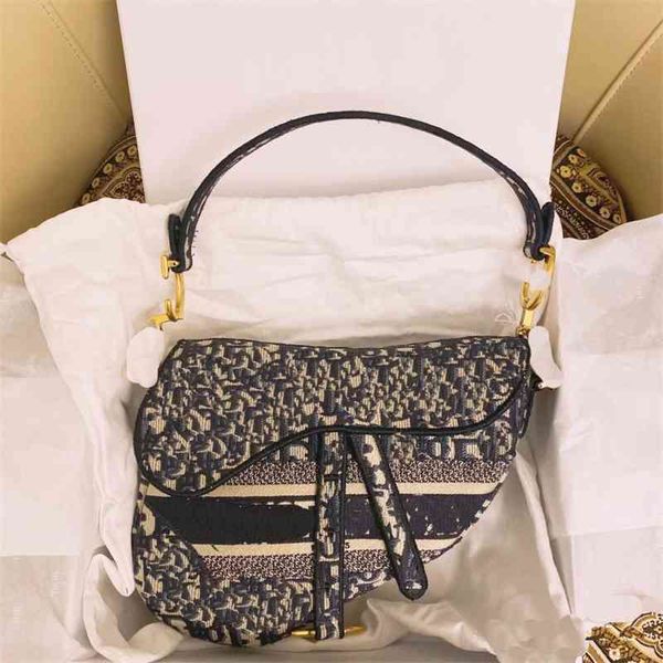 design saddle new fashion wide shoulder belt women's single shoulder messenger bag fashion handbag handbags
design saddle new fashion wide shoulder belt women's single shoulder messenger bag fashion handbag handbags