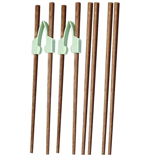 chopsticks 4 pairs of wooden and 2 help train the to be reusable, suitable for beginners
chopsticks 4 pairs of wooden and 2 help train the to be reusable, suitable for beginners