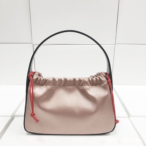 same silk face with leather drawstring bucket bag