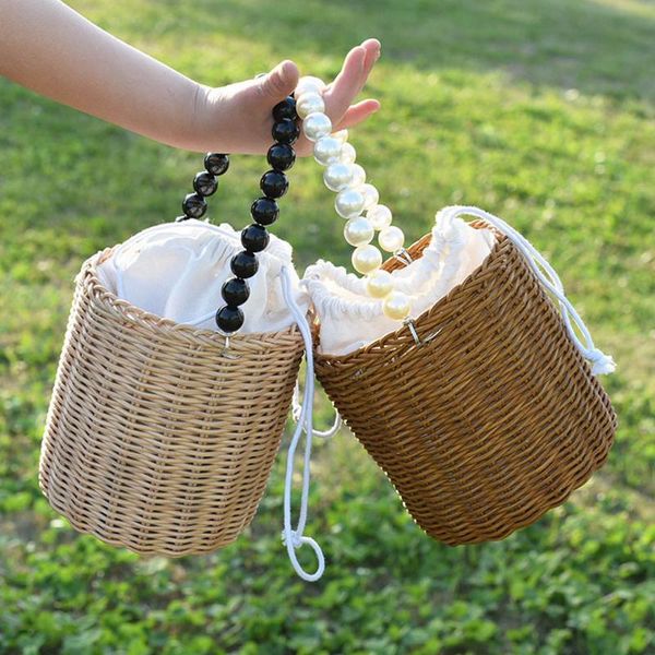 storage baskets woven portable rattan basket bag with beaded handle picnic container drawstring
storage baskets woven portable rattan basket bag with beaded handle picnic container drawstring