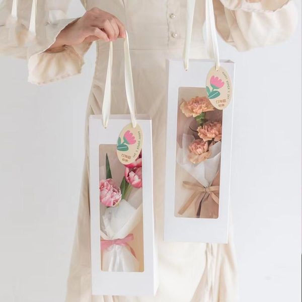 creative flower packaging bouquet bag with handle opening portable paper bags floral material gift packing wrap
creative flower packaging bouquet bag with handle opening portable paper bags floral material gift packing wrap