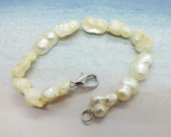 beaded, strands 10mm real ivory white baroque pearl bracelet. give girl very beautiful gift 7.5", Black
beaded, strands 10mm real ivory white baroque pearl bracelet. give girl very beautiful gift 7.5", Black
