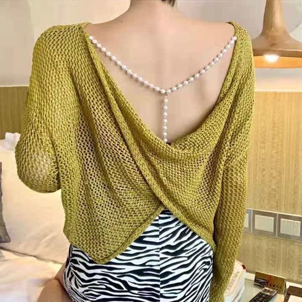 women's sweaters pearl chain backless knitwear back cross hollow out pullover spring vintage long sleeve loose knitted sweater, White;black
women's sweaters pearl chain backless knitwear back cross hollow out pullover spring vintage long sleeve loose knitted sweater, White;black