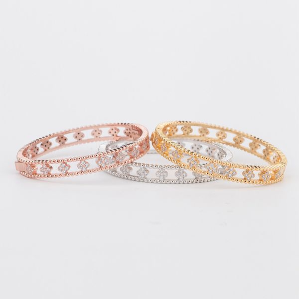 european and american fashion cuff plum blossom series copper plated real gold inlaid 3a zircon open chrysanthemum bracelet hollow women, White
european and american fashion cuff plum blossom series copper plated real gold inlaid 3a zircon open chrysanthemum bracelet hollow women, White
