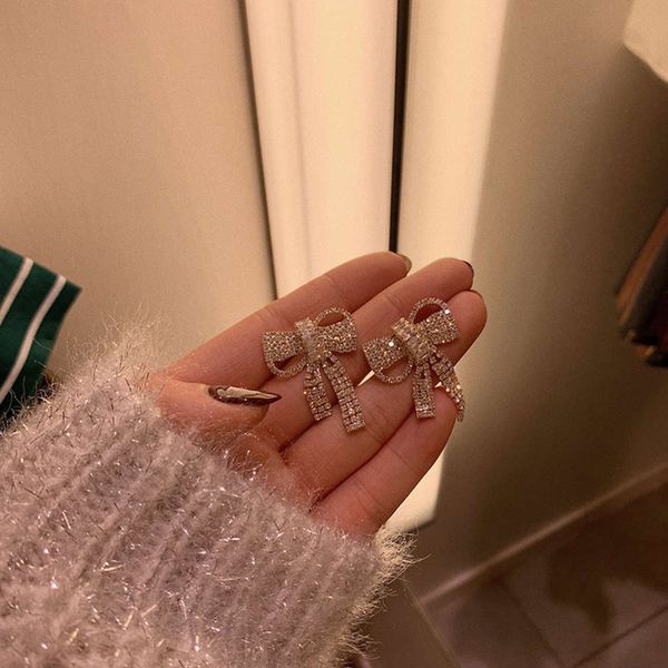 925 silver needle feminine long bow korean style versatile earrings 2020 new fashion ear accessories, Black
925 silver needle feminine long bow korean style versatile earrings 2020 new fashion ear accessories, Black