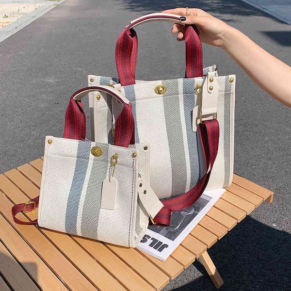 designer handbags women's 2021 new trend fashion large capacity portable tote popular stripe simple one shoulder messenger bag, Red;black
designer handbags women's 2021 new trend fashion large capacity portable tote popular stripe simple one shoulder messenger bag, Red;black