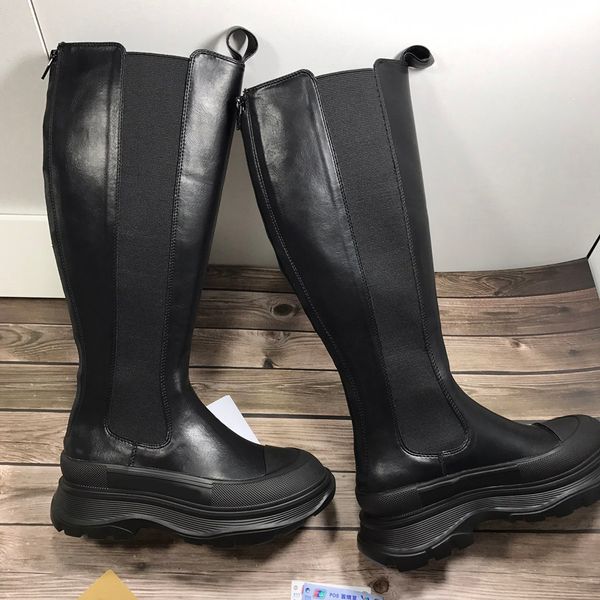 womens designer knee high chelsea boots fall winter fashion tread slick platform round toed boot with leather pull tabs on the front, Black
womens designer knee high chelsea boots fall winter fashion tread slick platform round toed boot with leather pull tabs on the front, Black