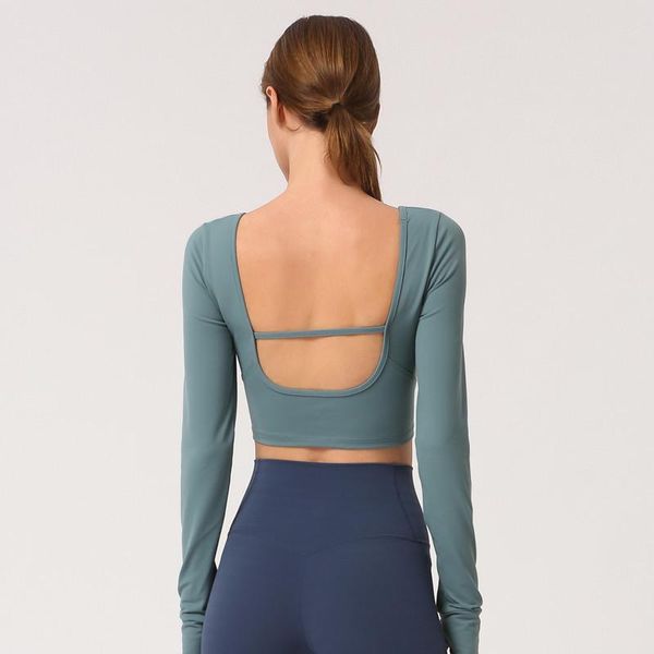 yoga outfit arrival long sleeve wear beauty back navel workout clothes t-shirt female with chest pad
yoga outfit arrival long sleeve wear beauty back navel workout clothes t-shirt female with chest pad
