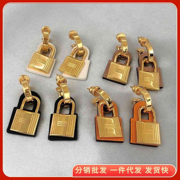 charms brass plated small lock earrings female minority design sense simple earrings net red, Golden
charms brass plated small lock earrings female minority design sense simple earrings net red, Golden
