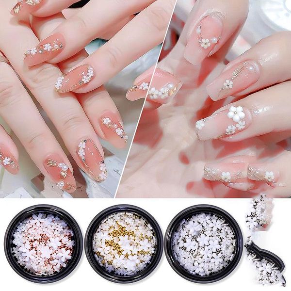 nail art decorations 1box white five petal resin flower decor with rhinestone pearl&gold beads in the jar diy tips manicure charms &*&, Silver;gold
nail art decorations 1box white five petal resin flower decor with rhinestone pearl&gold beads in the jar diy tips manicure charms &*&, Silver;gold