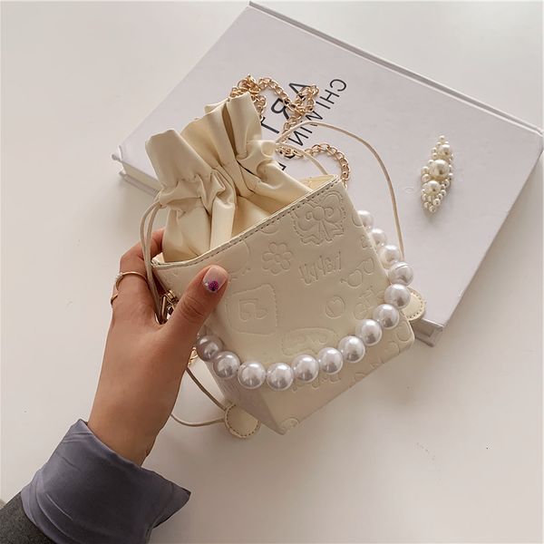 french minority personality mini box small women's new fashion pearl portable one shoulder messenger bag
french minority personality mini box small women's new fashion pearl portable one shoulder messenger bag