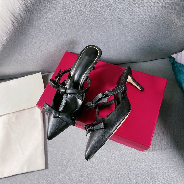 the new bow high-heeled sandals empty after flat belt with high heels wholesale sandal luxury goods black and red size 35 to 40
the new bow high-heeled sandals empty after flat belt with high heels wholesale sandal luxury goods black and red size 35 to 40