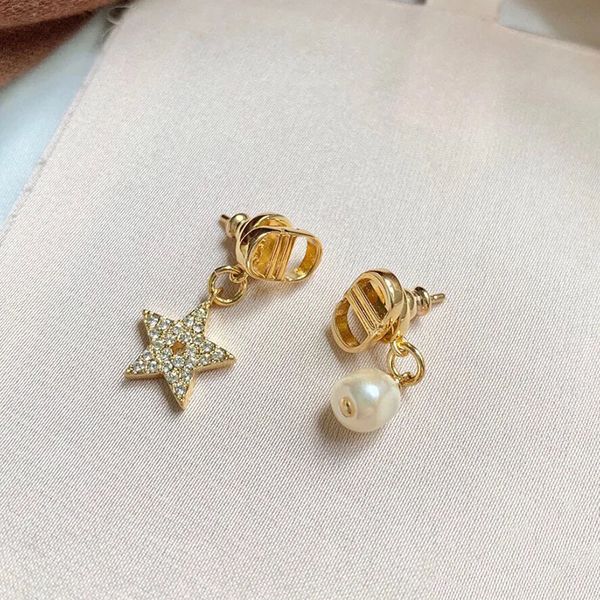 home 925 silver needle inlaid diamond letter asymmetric star front and back earrings fashion simple earrings
home 925 silver needle inlaid diamond letter asymmetric star front and back earrings fashion simple earrings