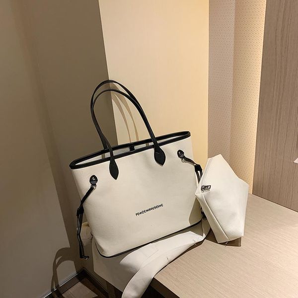 simple elegant casual canvas large-capacity niche designer commuter all-match tote fashion shoulder women's handbag cross body
simple elegant casual canvas large-capacity niche designer commuter all-match tote fashion shoulder women's handbag cross body