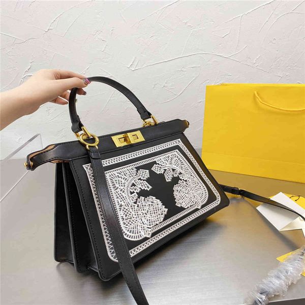 designer classic large capacity handbag luxury design embroidered pattern leather bag single handle retro elegant women's shoulder purs
designer classic large capacity handbag luxury design embroidered pattern leather bag single handle retro elegant women's shoulder purs