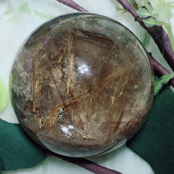 golden rutilated sphere decorative objects & figurines 
golden rutilated sphere decorative objects & figurines