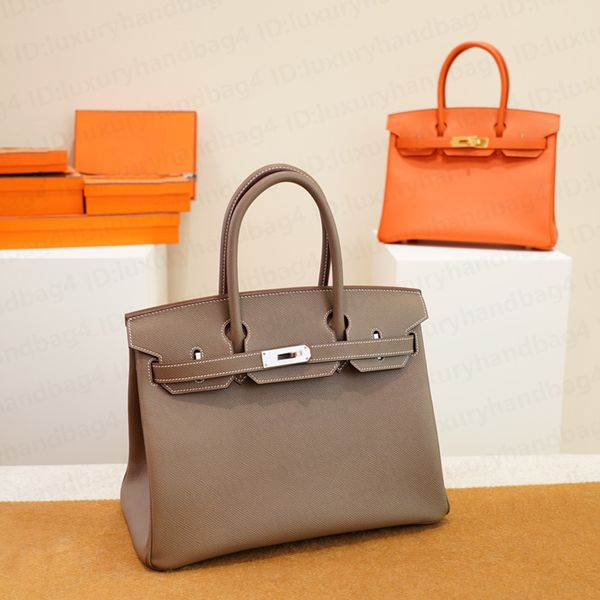 classic designer women totes genuine leather canvas bags with lock strap lady fashion handbag
classic designer women totes genuine leather canvas bags with lock strap lady fashion handbag
