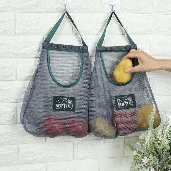 storage bags hang the kitchen fruit and vegetable with a bag, hollow breathable ginger garlic
storage bags hang the kitchen fruit and vegetable with a bag, hollow breathable ginger garlic