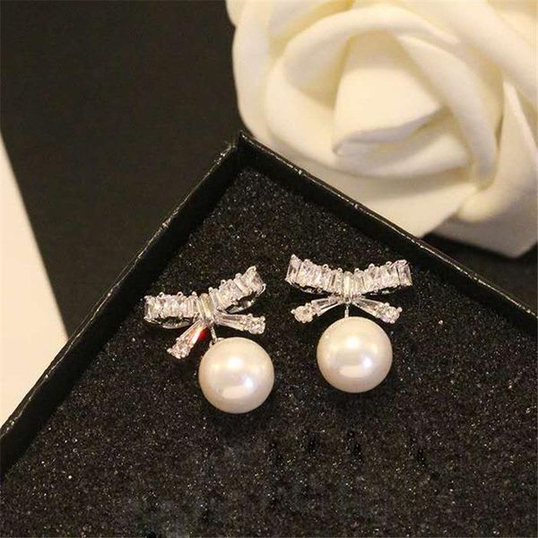 dangle & chandelier korean temperament simple zircon bow pearl earrings hypoallergenic s925 silver ladies jewelry
dangle & chandelier korean temperament simple zircon bow pearl earrings hypoallergenic s925 silver ladies jewelry