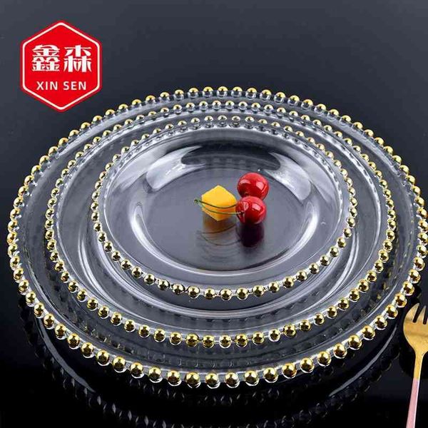 xinsen pearl creative personality wind transparent glass cake western food golden bead edge plate
xinsen pearl creative personality wind transparent glass cake western food golden bead edge plate