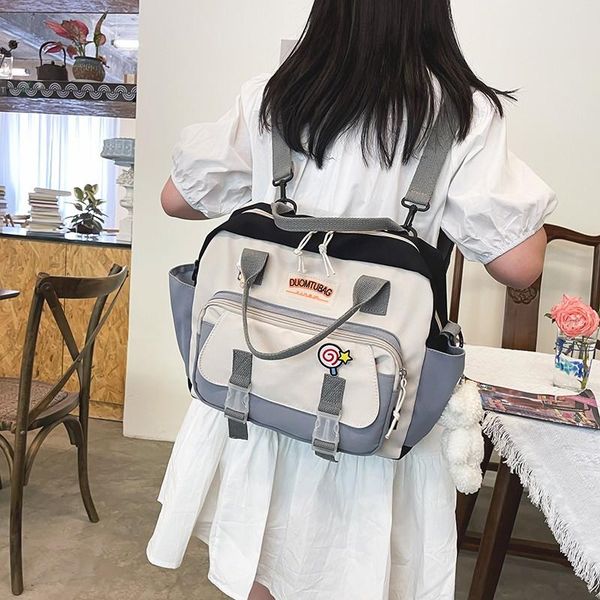 school bags fashion contrast color women's backpack nylon waterproof student messenger bag large capacity and lightweight backpacks
school bags fashion contrast color women's backpack nylon waterproof student messenger bag large capacity and lightweight backpacks